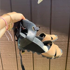 Sorel Tan and Black Wedge Sandals